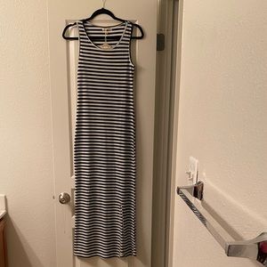 Ace Fashion Sleeveless, Form Fitted, Back & White Stripped Maxi Dress